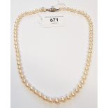 Single row graduated cultured pearl necklace with white gold diamond set clasp