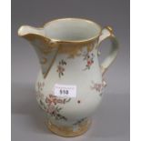 19th Century Continental porcelain jug with hand painted floral and gilded decoration, 9.25ins