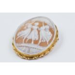 9ct Yellow gold mounted oval cameo brooch, decorated with three classical figures of maidens