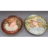 Late 19th / early 20th Century pottery charger, hand painted with a portrait of a girl wearing a