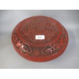 Chinese red cinnabar lacquer circular box and cover with typical all-over relief work decoration,