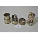 Five various silver napkin rings and three plated napkin rings
