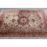 Indo Persian rug with a lobed medallion and all-over stylised floral design on an ivory ground
