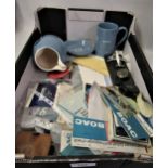 Box containing a quantity of B.O.A.C airline memorabilia, including postcard, tickets, porcelain