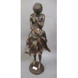 Brown patinated bronzed composition figure of a girl, 20ins high (with damages)