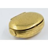 Antique oval gilt metal snuff box