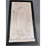 Painted plaster relief wall plaque depicting a classical female carrying an oil lamp, signed with