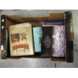 Box containing various art, furniture and ceramic reference books