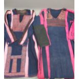 Two Palestinian dresses, each later applied with antique woolwork panels