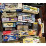 Box containing sixteen unbuilt plastic model kits including Airfix and Revell