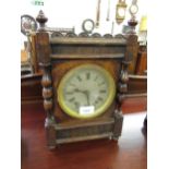 Edwardian oak two train mantel clock with silvered dial and Roman numerals, together with an oak