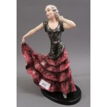 Large Goldscheider Art Deco pottery figure of a dancing girl in red dress (some cracks to glazing