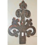 Group of four large late 19th Century iron decorative door hinge plates (two at fault)