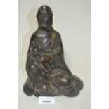 Brown patinated bronze figure of seated Chinese immortal holding a baby, 9ins high A few minor