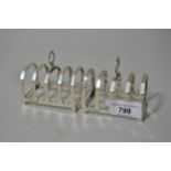 Pair of Birmingham silver four division toast racks dated 1937