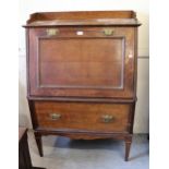 Early 20th Century oak bureau form drink's cabinet, possibly American, the galleried top above a