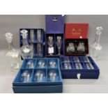 Etched glass suite of drinking glasses including three decanters together with a small quantity of