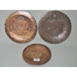 Group of three various Middle Eastern silver inlaid copper plates