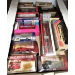 Box containing a quantity of various diecast Corgi model buses and fire engines, including a