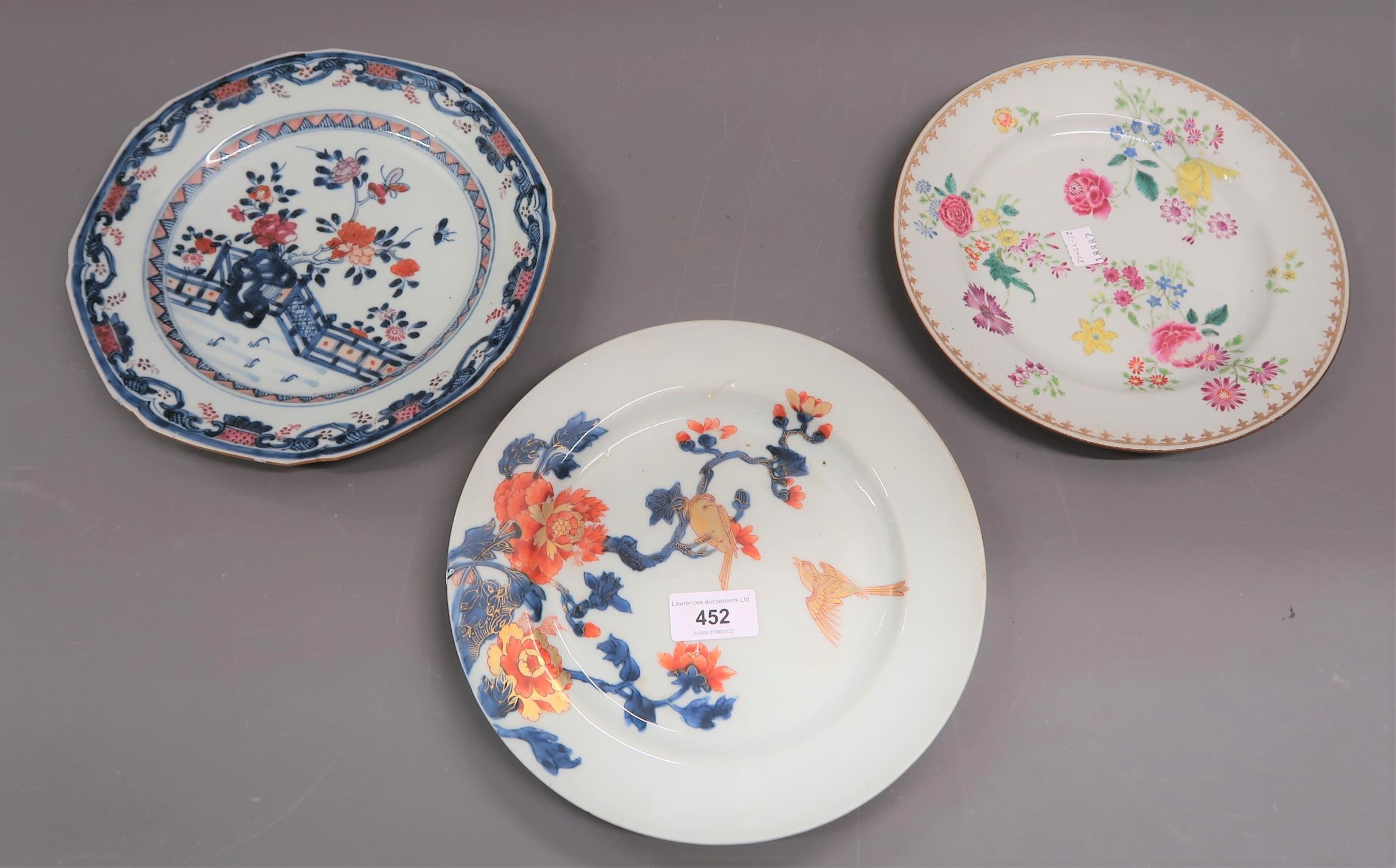 Group of three various 18th Century Chinese porcelain plates (all with damages), 9ins diameter All