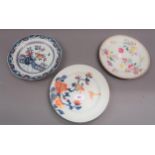 Group of three various 18th Century Chinese porcelain plates (all with damages), 9ins diameter All