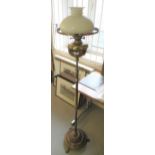 Edwardian brass oil lamp standard with opaque glass shade, together with a turned wooden standard
