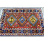 Turkish Caucasian design rug having three central hooked medallions with multiple borders on a