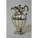 Good quality William IV silver claret jug of fluted design with scroll handle, London 1830, maker