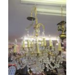 French gilt brass twelve branch chandelier