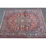 Small Tabriz rug with a lobed medallion and all-over stylised floral design, predominantly in shades