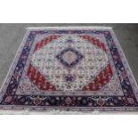 Indo Persian carpet with centre medallion and all-over floral design with multiple borders on a