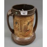 Large Bretby two handled loving cup with relief decoration in oriental style, 10.25ins high