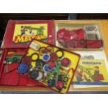 Two boxes containing a quantity of various Meccano, including instructions and a Meccano V