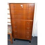 E. Gomme for G Plan, mid 20th Century teak narrow chest of seven drawers with brass handles,