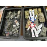 Pair of modern remote and voice command Japanese toy robots, quantity of plastic model tanks,