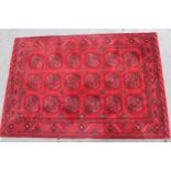 Modern Turkoman design machine woven rug with multiple gols and borders on a red ground, 80ins