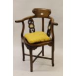 20th Century Chinese exotic hardwood corner chair, with carved marble inset splat back, panelled