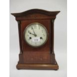 Edwardian mahogany marquetry inlaid mantel clock, the circular enamel dial with Arabic numerals