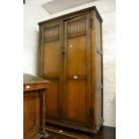 Waring & Gillow oak two door wardrobe