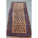 Belouch rug with an all-over Boteh design on a beige ground with borders, 7ft x 3ft 4ins
