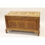 Chinese hardwood blanket box, the panelled top and front with Chinese character marks, on cabriole