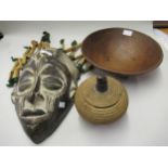 African tribal carved wood mask, two figures decorated with cowrie shells, wooden bowl and a