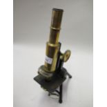 Early 20th Century brass and black japanned monocular microscope by Swift & Son, London