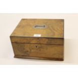 Victorian figured walnut jewellery box, the hinged cover enclosing a fitted interior with lift-out