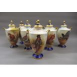 Set of eight Ainsley two handled baluster form vases with covers painted with various animals and