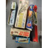 Box containing a collection of ten model aircraft kits including Airfix etc.