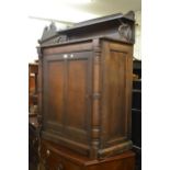 Late 19th Century oak chiffonier, the galleried top above panelled doors on a plinth base, 43ins