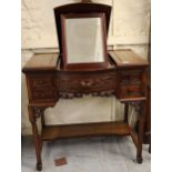 Late 20th Century Chinese exotic hardwood dressing table, the integral folding mirror above an