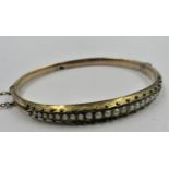 Victorian gold seed pearl set bangle, 7g