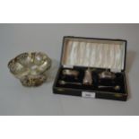Cased three piece Birmingham silver condiment set, together with a white metal (900 mark) bonbon